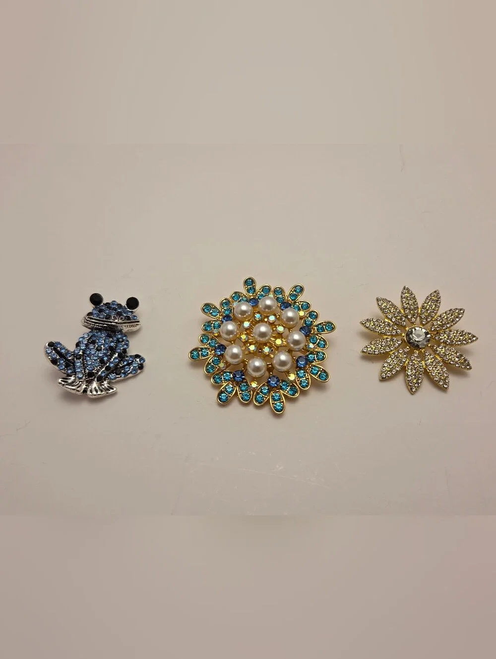 Gold Tone Floral Brooch with Blue Crystals and Pearls